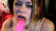 Pretty Princess sucks dildo