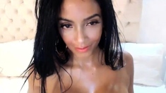 Busty curly brunette with big boobs fucks on couch