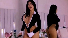 Brunette seductress working her big boobs and hot ass