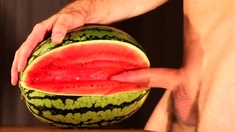 Muscular Stud Fucks And Cums On Watermelon