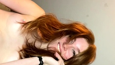 Solo pussy toying redhead close up action