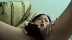 Horny Asian Masturbates With Hairbrush