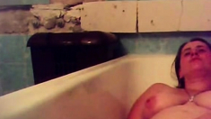 Orgasm of my mom in bath tube. Hidden cam