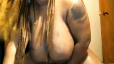 Black BBW with huge tits goes crazy on dildo, screaming